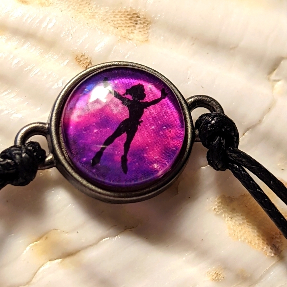 💜 Disney Bracelet Peter Pan purple 3" stretches 4.5" Adjustable raw hide